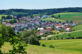 village near forest at summer, germany, bavaria