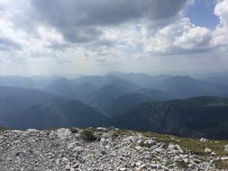 stone rock with clouds view