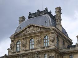 museum building with sculptures in paris