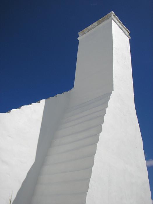 Beautiful, white house in Barbados, under the blue sky