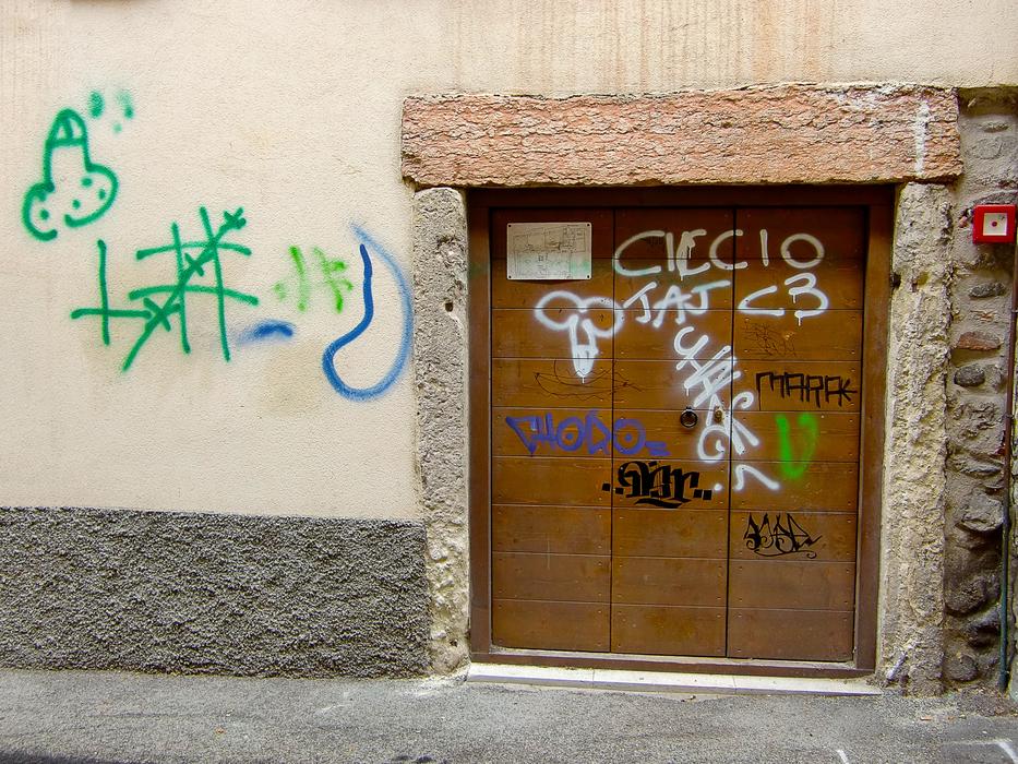 spray lettering on the front door of the building