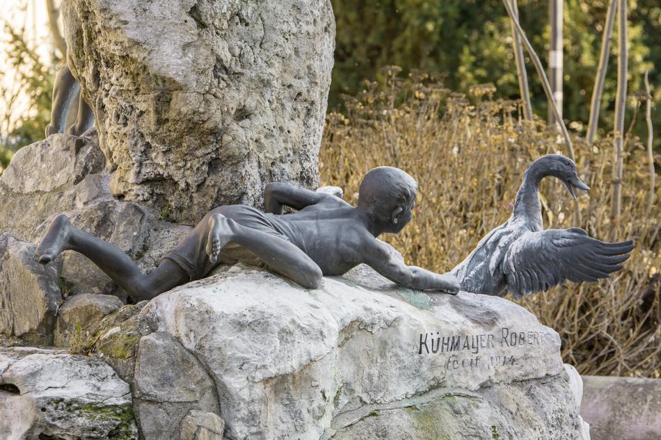 Sculpture boy and bird
