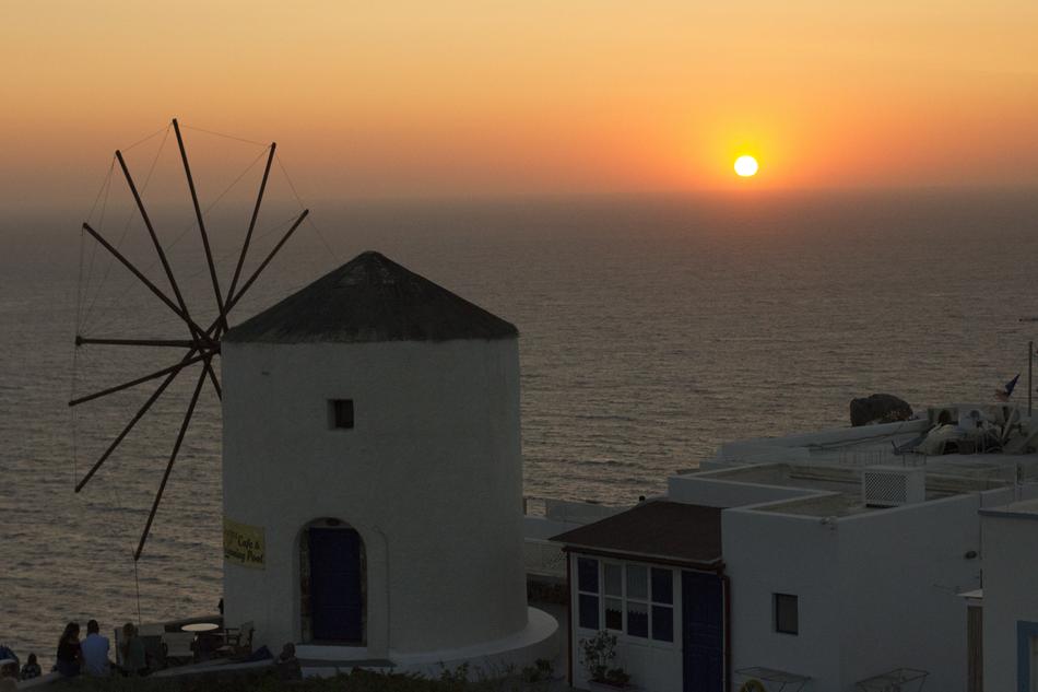 white mill in the city by the sea