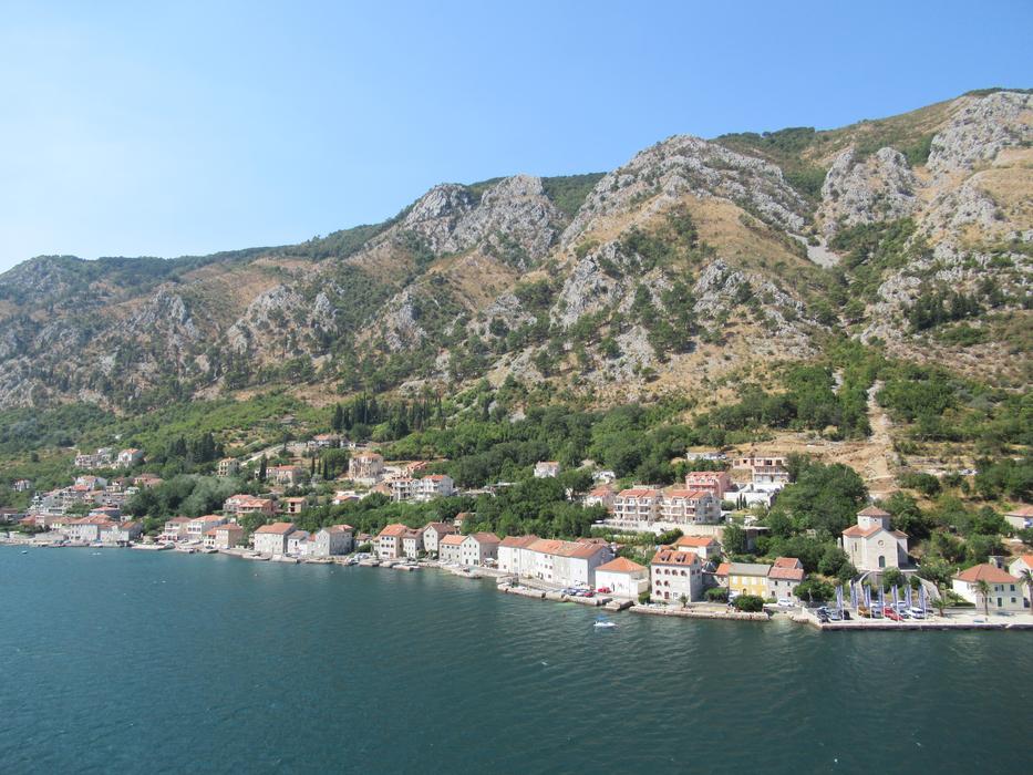 high mountain near the village by the sea