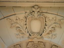 architectural stucco molding on a historical facade close-up