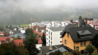 panorama of city roofs in the haze