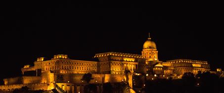 night photo of illuminated historic building in Budapest, Hungary