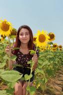 Girl and Yellow Sunflower