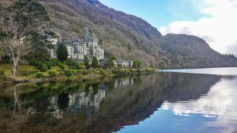 Castle by the rocks and the lake