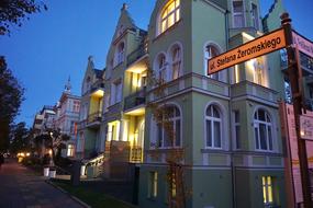 Colorful and beautiful architecture and signs in the city, in the evening