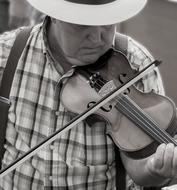 Man with a violin black and white