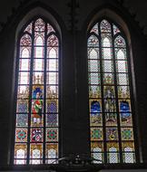 multicolored stained glass windows in a gothic church, schleswig