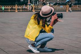 Photographer Girl yellow jacket