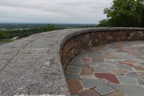 stone wall and tile floor