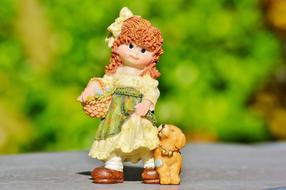 Girl with dog, vintage figurine