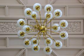 white gold chandelier in the interior