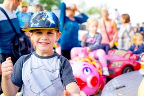 happy Child Boy in amusement park