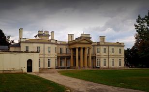 Beautiful and colorful Dundurn Castle in Hamilton, Ontario, Canada, among the green plants