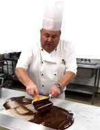 man makes chocolate