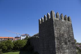 black fortress of the old castle on a sunny day