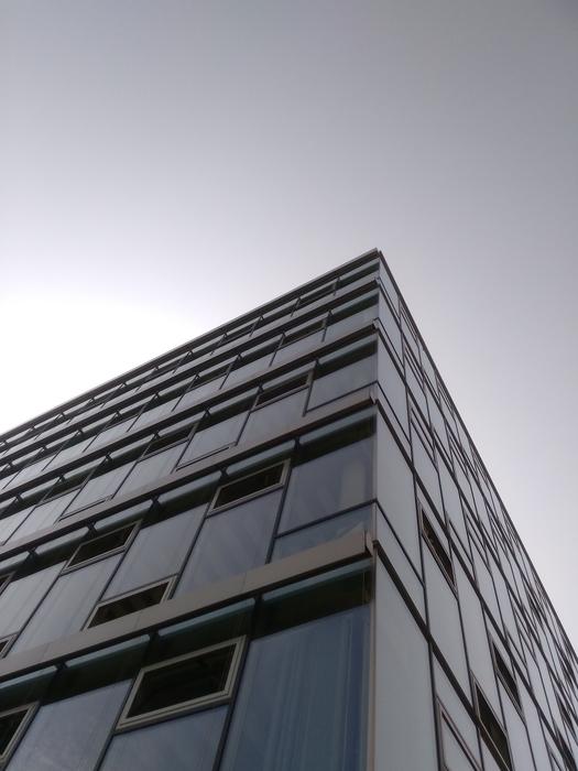 Glass House and grey sky