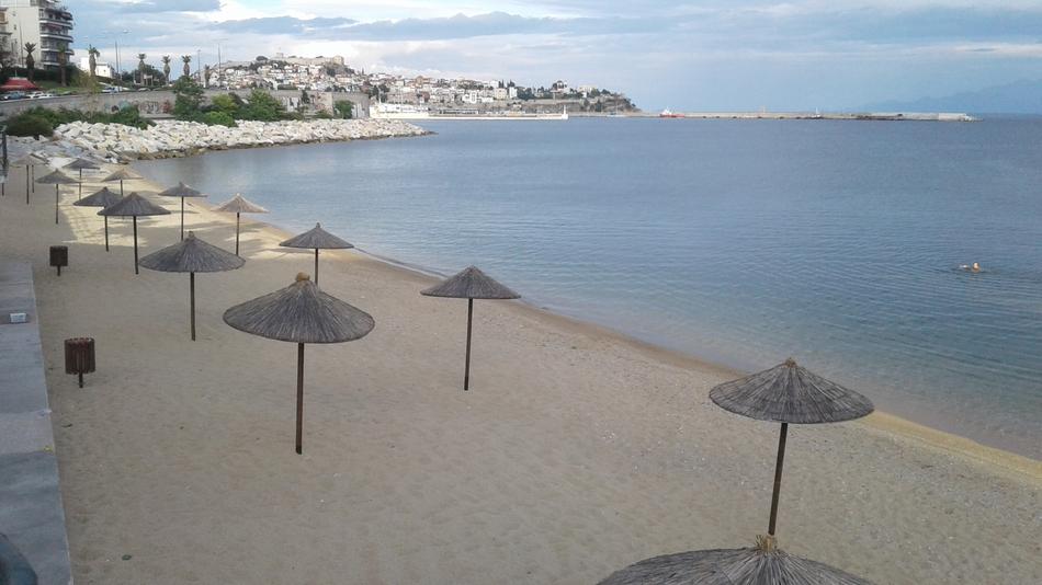 small umbrellas on the sandy beach