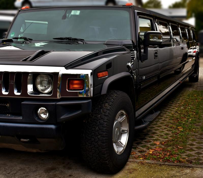 a black car in the grass