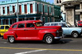 red car in traffic