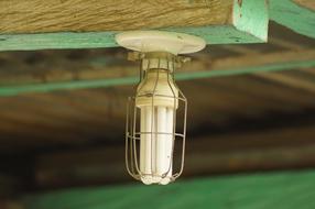 white lamp on the wooden ceiling