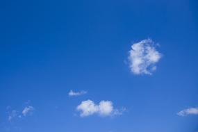 white clouds in a blue sky