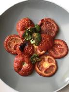 Roasted tomatoes in a plate