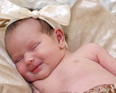 smiling newborn Baby sleeping