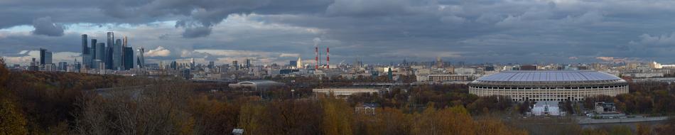 panorama of the stadium and city buildings in Moscow