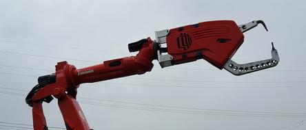 Robot Machine red against the sky