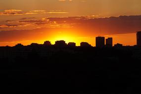 Silhouette of Warsaw, Poland, at colorful and beautiful sunset on horizon