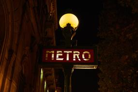 subway lettering light night