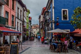 tourists in the old town in Ribadesella