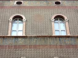 old arched windows on the facade