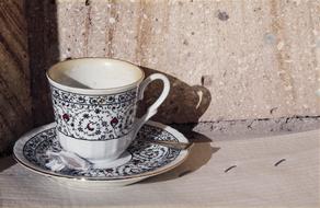 colorful mug by the wall