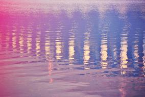 of the bridge reflections in the pink lake.