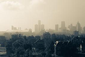 panoramic view of the cityscape in the fog