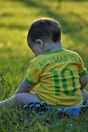 a kid in a soccer jersey