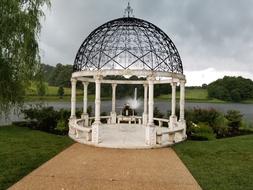 white pergola with glass roof