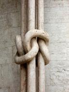 photo of a pillar with a decorative knot