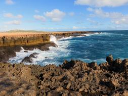 sea waves cliffs shore