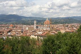 Beautiful and colorful Florence, among the colorful plants on the mountains, in Italy