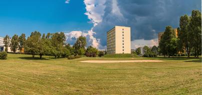 building of Kielce University of Technology in park at summer, poland