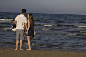 a lovely couple by the sea