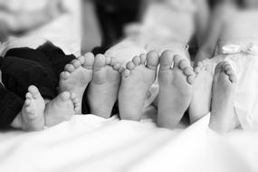 Feet of Children Together