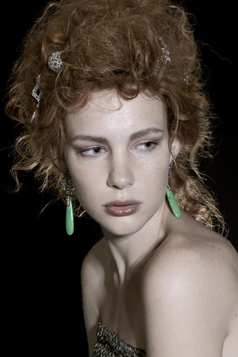 portrait of a girl with a lush hairstyle